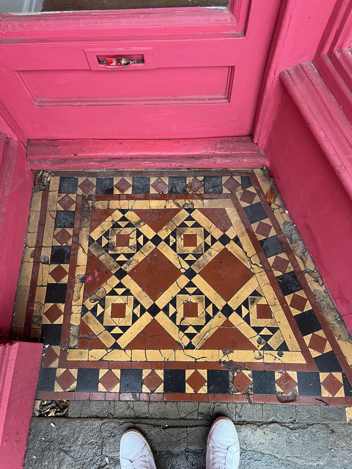The original Victorian tiled doorstep