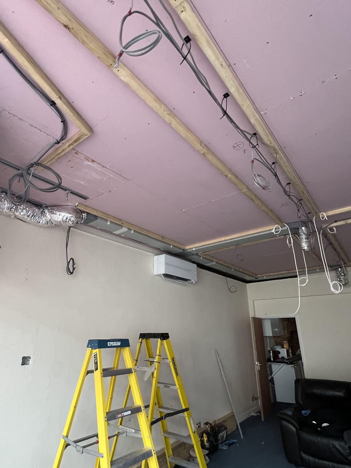 Wiring run through the coffer voids
