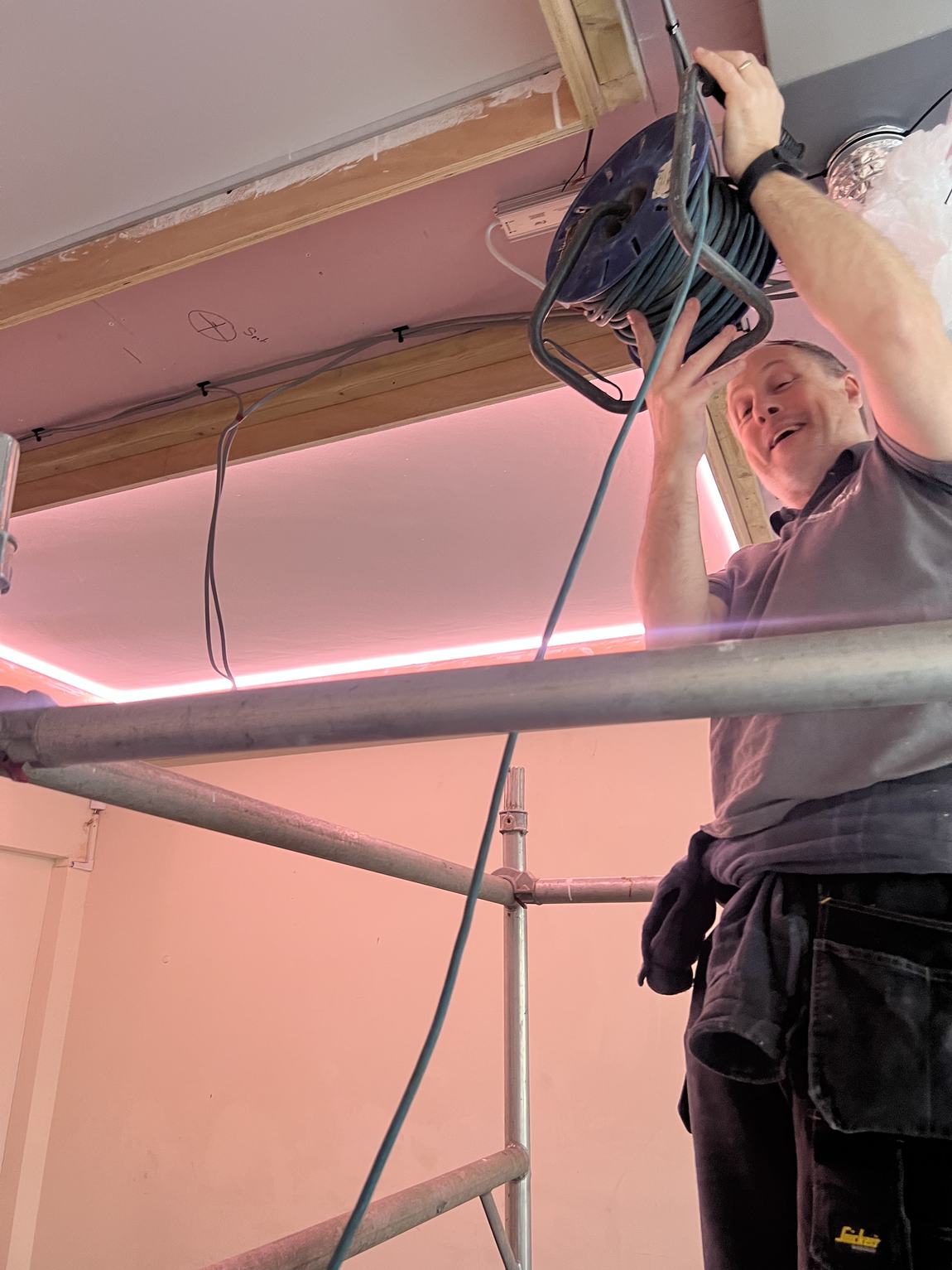 First LED strip glowing pink around a coffer